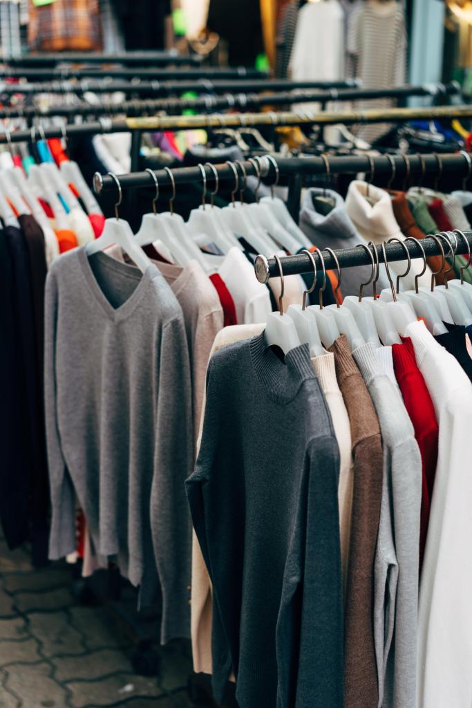 clothes on a rack in a clothing store 683x1024 1