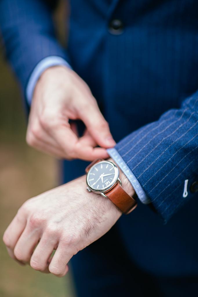 a watch and pinstripe suit 683x1024 1