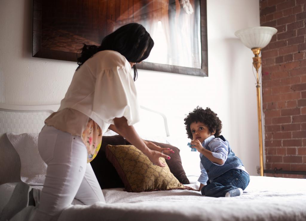 mom and toddler on bed 1024x739 1