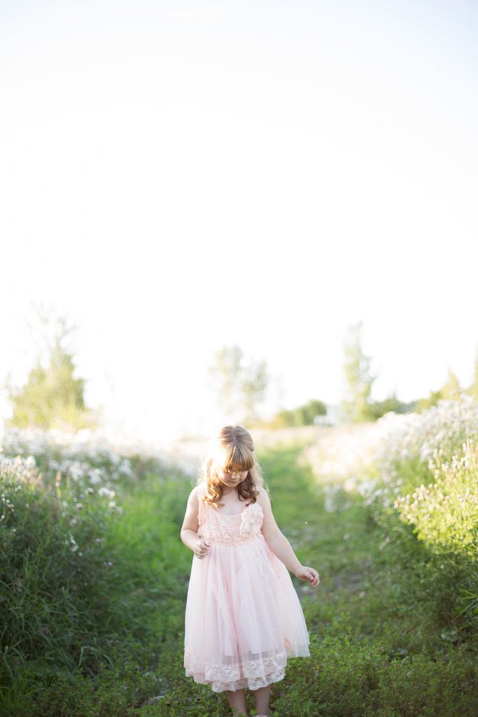 girl on grassy path 683x1024 1